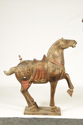 Lot 237 - A MID 19TH CENTURY CHINESE TANG DYNASTY STYLE POLYCHROME DECORATED CARVED SCULPTURE OF A HORSE