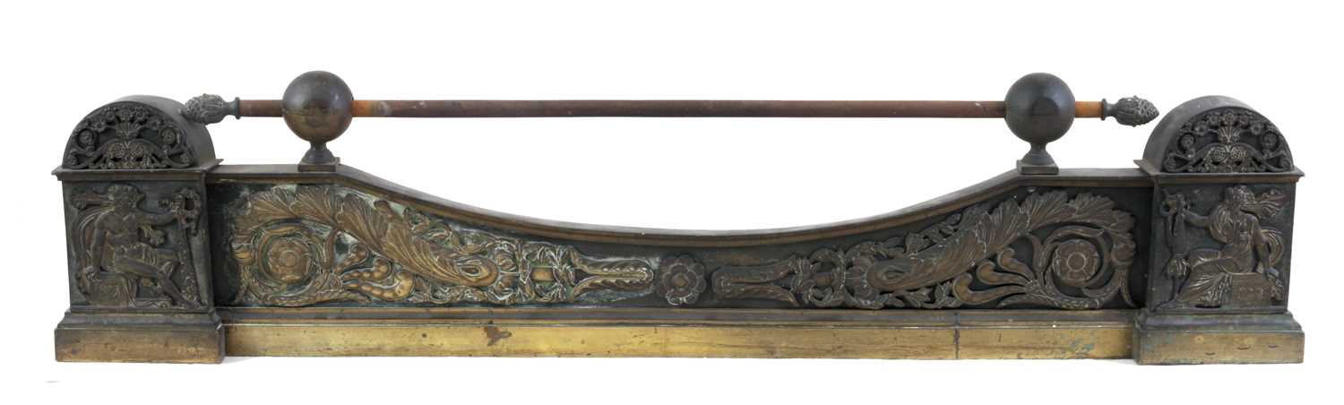 Lot 544 - AN UNUSUAL REGENCY BRASS ADJUSTABLE HEARTH...