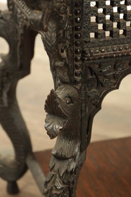 Lot 149 - A LATE 19TH CENTURY ANGLO INDIAN TWO TIER HARDWOOD OCCASIONAL TABLE