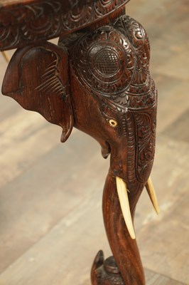 Lot 245 - A 19TH CENTURY INDIAN CARVED HARDWOOD OCCASIONAL TABLE