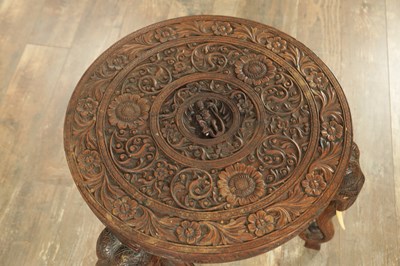 Lot 245 - A 19TH CENTURY INDIAN CARVED HARDWOOD OCCASIONAL TABLE