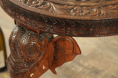 Lot 245 - A 19TH CENTURY INDIAN CARVED HARDWOOD OCCASIONAL TABLE