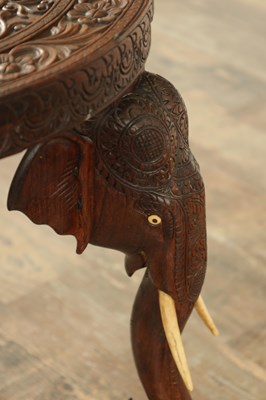 Lot 245 - A 19TH CENTURY INDIAN CARVED HARDWOOD OCCASIONAL TABLE