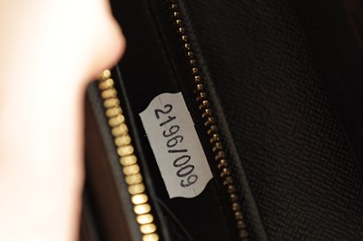 Lot 654 - A GENUINE LOUIS VUITTON BLACK EPI LEATHER PURSE/WALLET