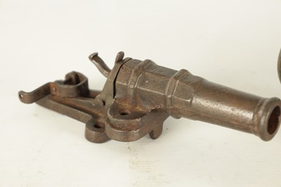 Lot 607 - A 19TH CENTURY BRONZE MODEL OF A STARTER CANNON