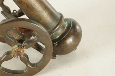Lot 607 - A 19TH CENTURY BRONZE MODEL OF A STARTER CANNON