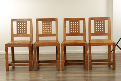 Lot 1259 - A SET OF FOUR ROBERT ‘MOUSEMAN’ THOMPSON AZED OAK LATTICE BACK DINING CHAIRS