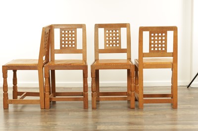 Lot 1259 - A SET OF FOUR ROBERT ‘MOUSEMAN’ THOMPSON AZED OAK LATTICE BACK DINING CHAIRS