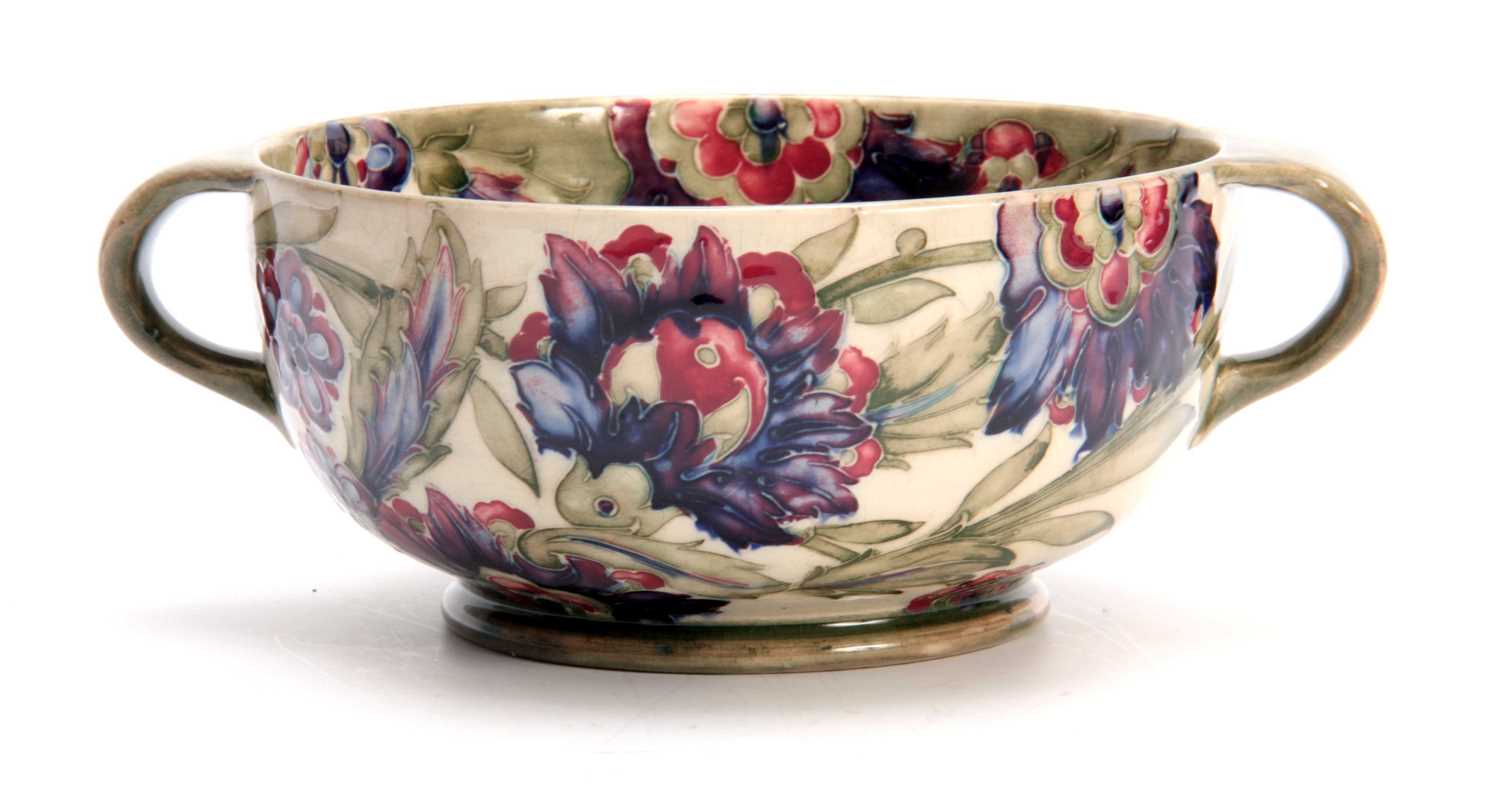 Lot 41 - A WILLIAM MOORCROFT BURSLEM FOOTED TWO-HANDLED BOWL