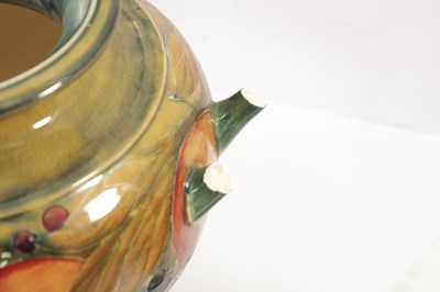 Lot 42 - AN EARLY WILLIAM MOORCROFT LARGE TWO-HANDLED FOOTED BULBOUS VASE