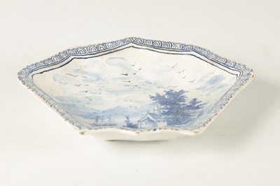 Lot 80 - AN 18TH/19TH CENTURY DELFT BLUE AND WHITE SHAPED SHALLOW DISH