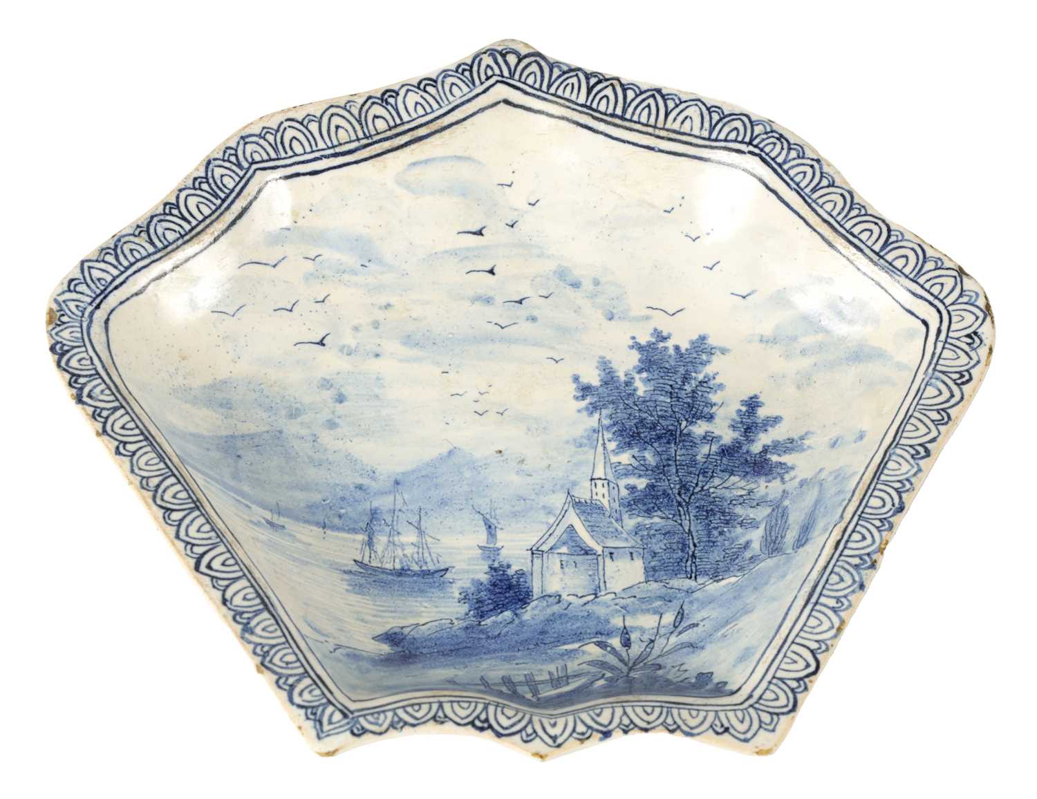 80 - AN 18TH/19TH CENTURY DELFT BLUE AND WHITE SHAPED SHALLOW DISH