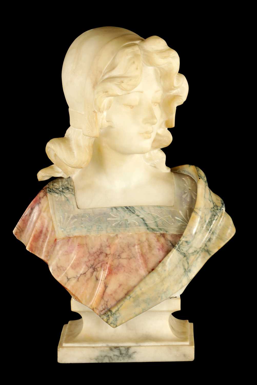 Lot 775 - AN ART DECO CARVED MIXED MARBLE BUST OF A YOUNG LADY