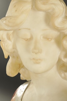 Lot 775 - AN ART DECO CARVED MIXED MARBLE BUST OF A YOUNG LADY