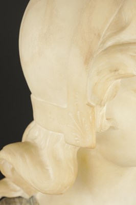 Lot 775 - AN ART DECO CARVED MIXED MARBLE BUST OF A YOUNG LADY