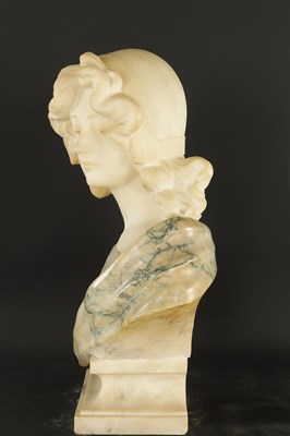 Lot 775 - AN ART DECO CARVED MIXED MARBLE BUST OF A YOUNG LADY