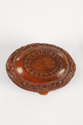Lot 755 - A 19TH CENTURY CARVED COQUILLA NUT SNUFF BOX