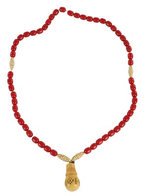 Lot 229 - A JAPANESE RED CORAL AND IVORY NECKLACE