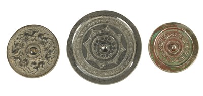 Lot 167 - A COLLECTION OF THREE EARLY CHINESE BRONZE MIRRORS