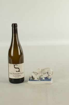 Lot 71 - A LATE 19TH CENTURY GERMAN BISQUE PORCELAIN SCULPTURE OF TWO WHIPPETS PLAYING