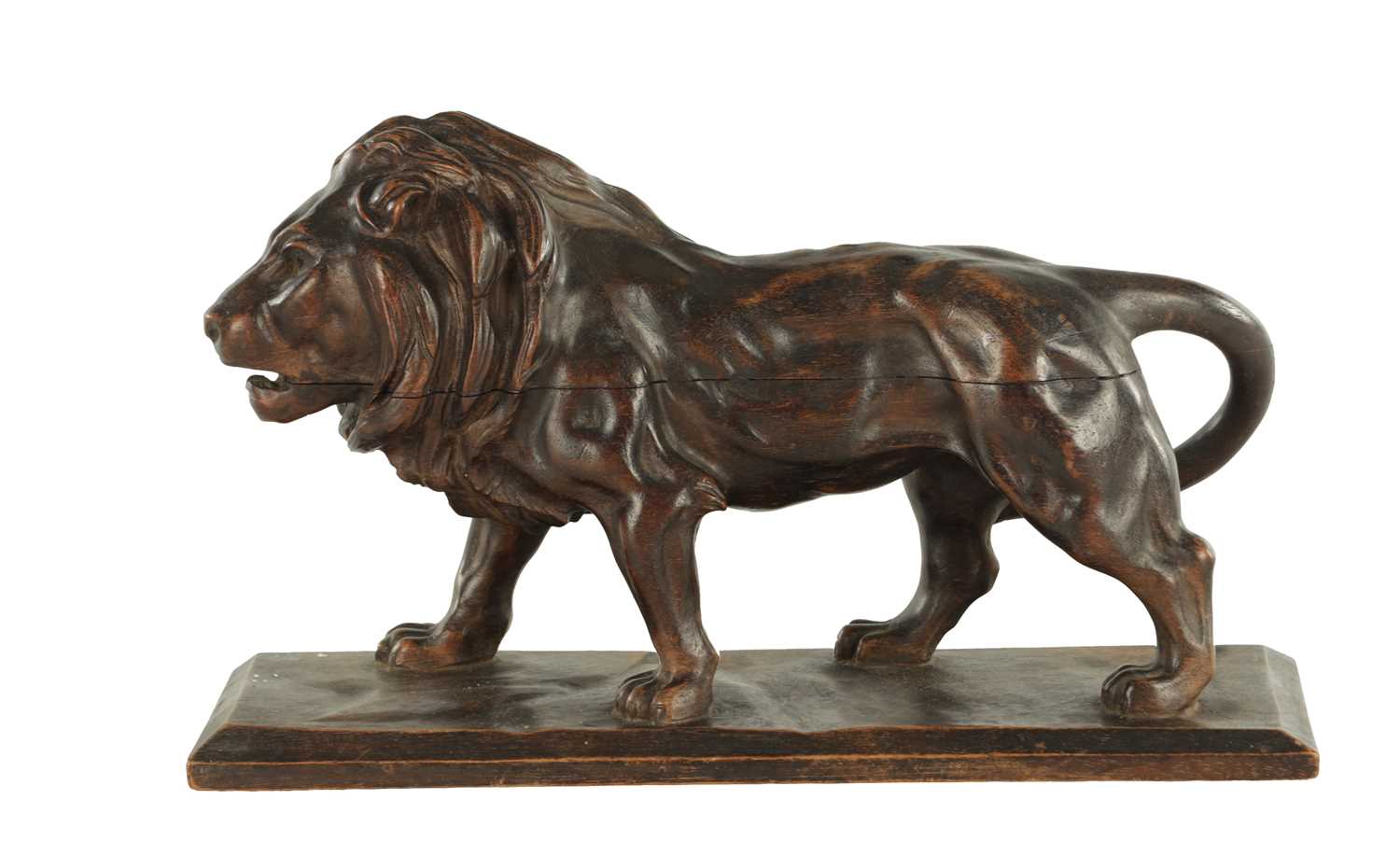 Lot 884 - A LATE 19TH CENTURY CONTINENTAL CARVED WOOD SCULPTURE OF A PROWLING LION