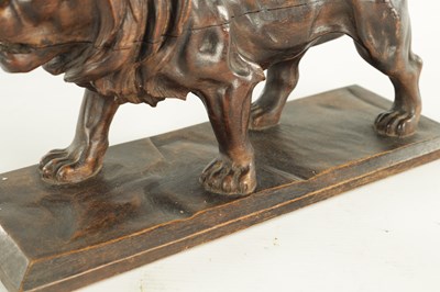 Lot 884 - A LATE 19TH CENTURY CONTINENTAL CARVED WOOD SCULPTURE OF A PROWLING LION