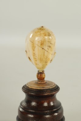 Lot 759 - A 19TH CENTURY SCRIMSHAW-CARVED MARINE IVORY SCULPTURE MODELLED AS A SPERM WHALE