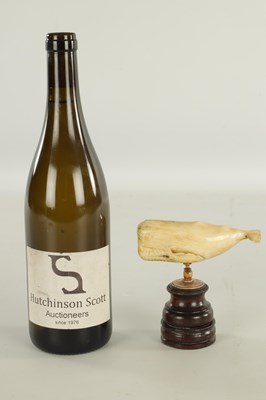 Lot 759 - A 19TH CENTURY SCRIMSHAW-CARVED MARINE IVORY SCULPTURE MODELLED AS A SPERM WHALE