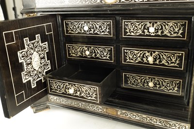 Lot 906 - A 19TH CENTURY ITALIAN EBONISED AND IVORY INLAID COLLECTORS CABINET