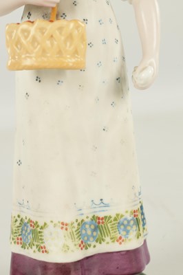 Lot 74 - A LATE 19TH CENTURY GARDENER IMPERIAL RUSSIAN PORCELAIN FIGURE