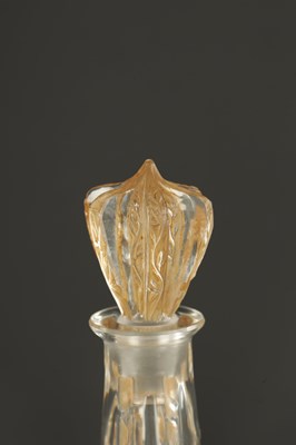 Lot 33 - AN R LALIQUE SIX-FIGURINE AMBER STAINED GLASS DECANTER