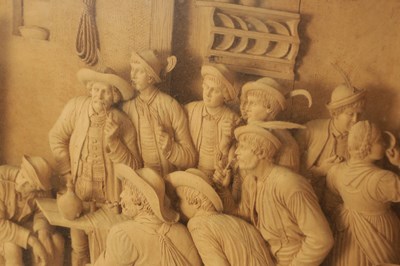 Lot 893 - A FINE EARLY 19TH CENTURY CONTINENTAL CARVED LIME WOOD TAVERN SCENE