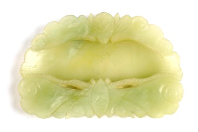 Lot 238 - A CHINESE PALE GREEN CARVED JADE BRUSH WASHER