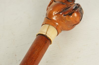 Lot 493 - A LATE 19TH CENTURY BOXWOOD CARVED BULLDOG HANDLED WALKING STICK WITH ENCLOSED OPIUM PIPE