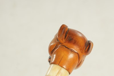 Lot 493 - A LATE 19TH CENTURY BOXWOOD CARVED BULLDOG HANDLED WALKING STICK WITH ENCLOSED OPIUM PIPE