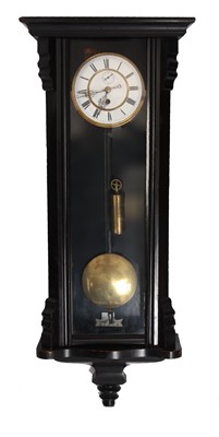 Lot 702 - A LATE 19TH CENTURY EBONISED VIENNA WALL CLOCK...