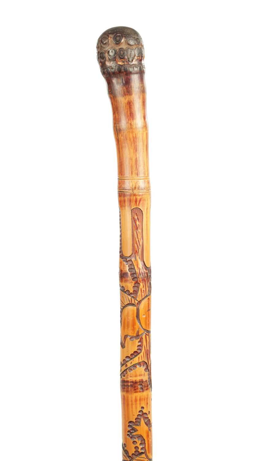 Lot 515 - AN EARLY 20TH CENTURY JAPANESE CARVED BAMBOO CARVED STICK WITH FITTED TELESCOPIC FISHING ROD