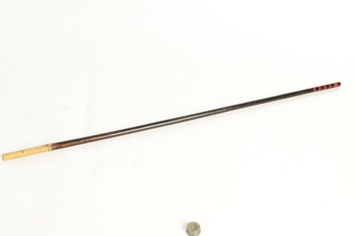 Lot 515 - AN EARLY 20TH CENTURY JAPANESE CARVED BAMBOO CARVED STICK WITH FITTED TELESCOPIC FISHING ROD