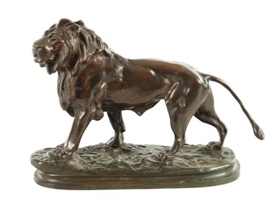 Lot 785 - A 19TH CENTURY BROWN PATINATED STANDING BRONZE LION