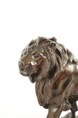 Lot 785 - A 19TH CENTURY BROWN PATINATED STANDING BRONZE LION