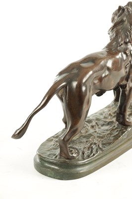 Lot 785 - A 19TH CENTURY BROWN PATINATED STANDING BRONZE LION