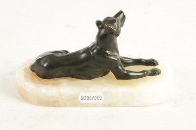 Lot 791 - A 19TH CENTURY FRENCH BRONZE AND WHITE ONYX RECUMBENT DOG DESK PAPERWEIGHT