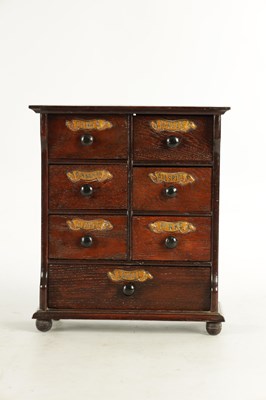 Lot 920 - A 19TH CENTURY OAK SPICE CABINET