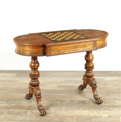 Lot 1215 - A FINE REGENCY FIGURED ROSEWOOD AND BRASS INLAID GAMES TABLE IN THE MANNER OF GILLOWS