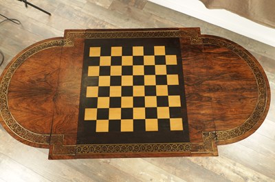 Lot 1215 - A FINE REGENCY FIGURED ROSEWOOD AND BRASS INLAID GAMES TABLE IN THE MANNER OF GILLOWS