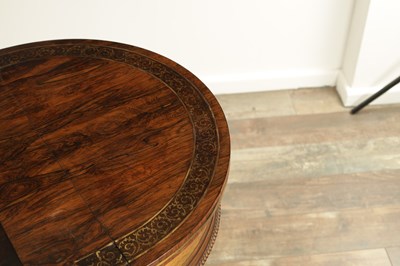 Lot 1215 - A FINE REGENCY FIGURED ROSEWOOD AND BRASS INLAID GAMES TABLE IN THE MANNER OF GILLOWS