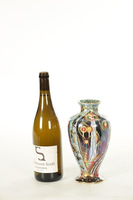Lot 93 - A GOOD EARLY 20TH CENTURY WEDGWOOD FAIRYLAND LUSTRE “CANDLEMAS” DESIGN CABINET VASE BY DAISY MAKEIG JONES