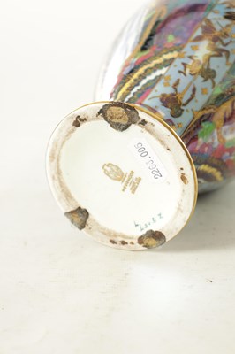 Lot 93 - A GOOD EARLY 20TH CENTURY WEDGWOOD FAIRYLAND LUSTRE “CANDLEMAS” DESIGN CABINET VASE BY DAISY MAKEIG JONES