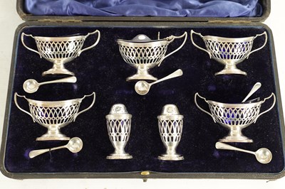 Lot 479 - A LATE VICTORIAN CASED TABLE CONDIMENT SET