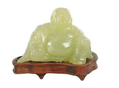 Lot 146 - A CHINESE CARVED JADE SCULPTURE OF A SEATED BUDDHA